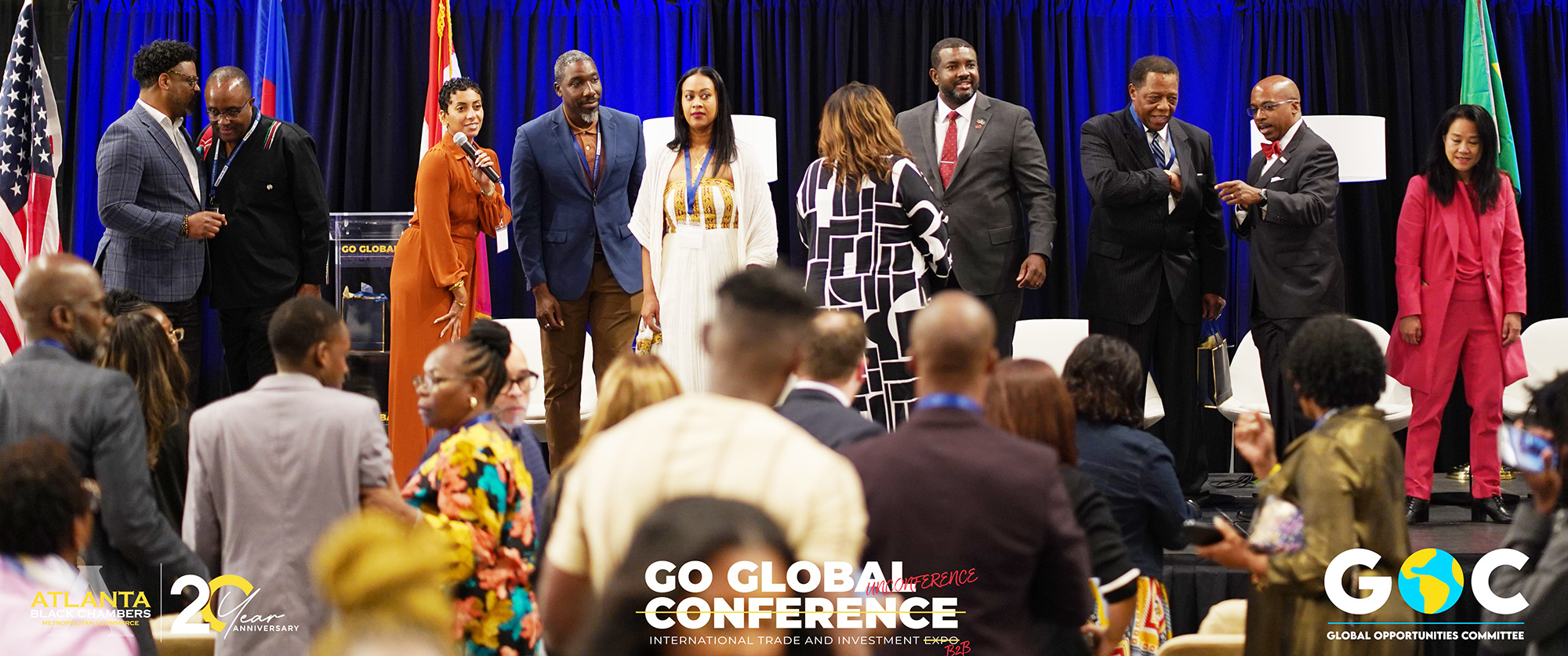 Delegates networking in the main hall of the Go Global Conference